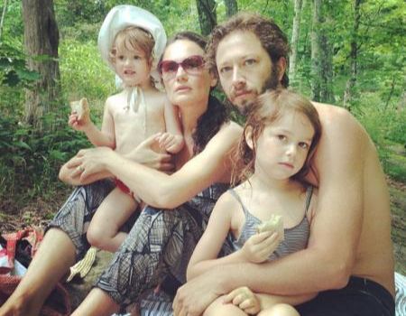 Ebon with wife, Yelena Yemchuk, and their two daughters